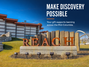 REACH Museum exterior and entrance sign with the message “Make Discovery Possible.